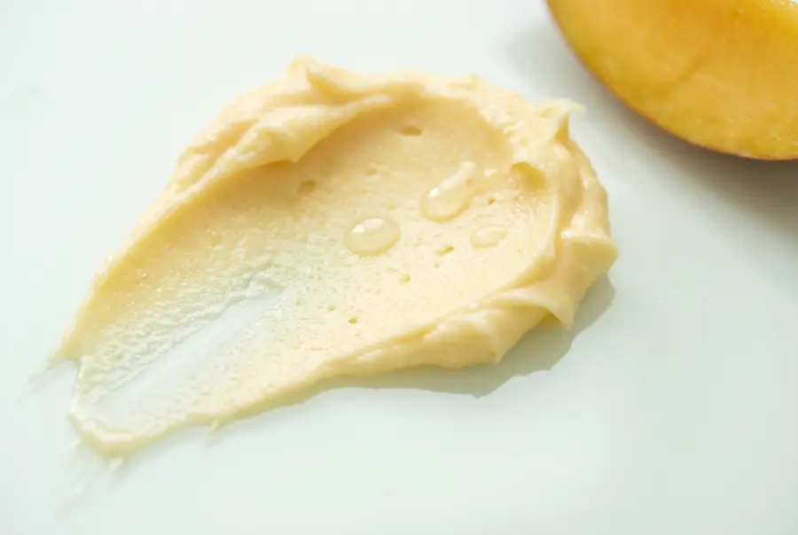 Close-up of shea mango massage butter texture
