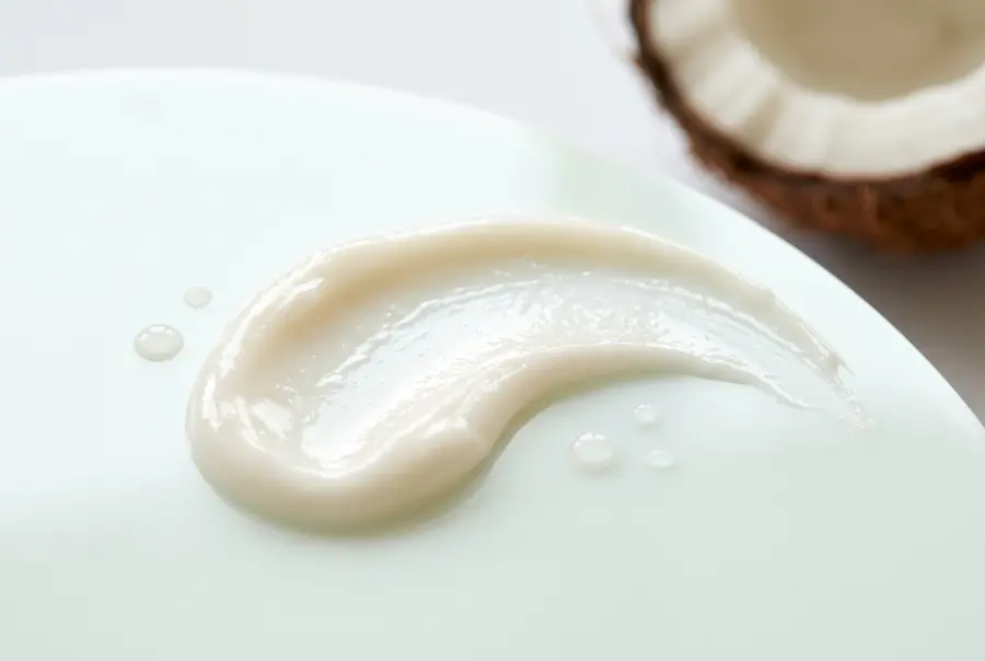 Close-up of nail and cuticle cream texture