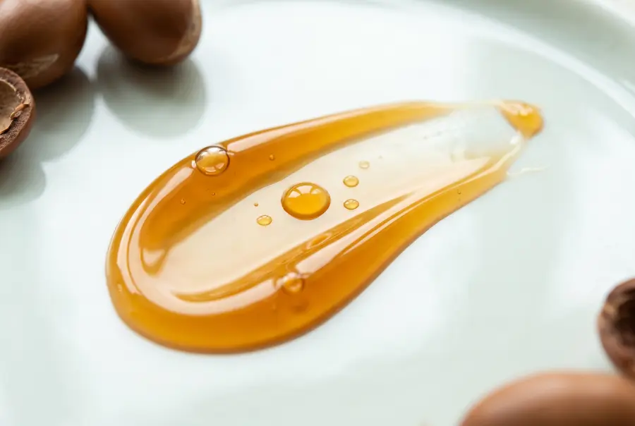 Texture huile de massage à l'argan en gros plan