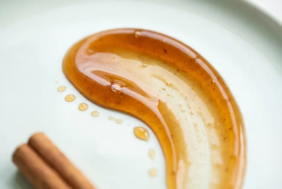 Close-up of cedar cinnamon massage oil texture