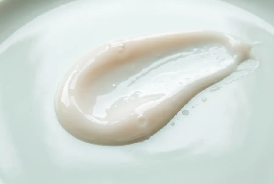 Close-up of neutral massage lotion texture